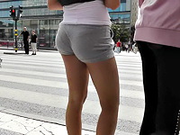 When walking along the street our cameraman suddenly noticed the beautiful and firm ass wrapped in spandex shorts of amateur babe